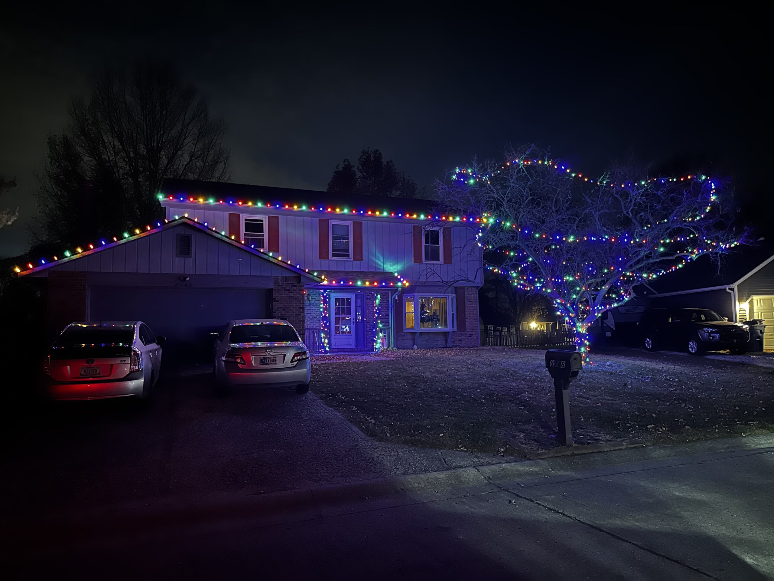 Holiday lighting installation with clean roofline edges